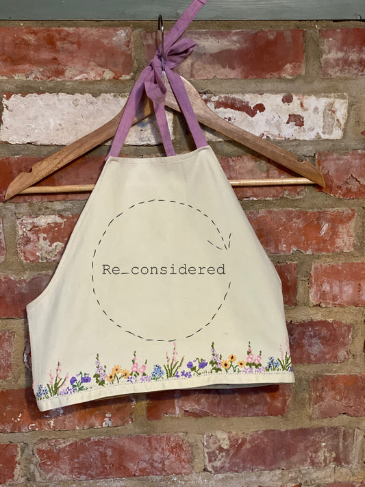 Re_considered logo on hanging apron