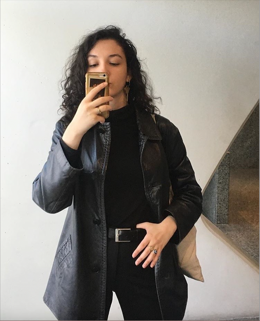 Lady in leather jacket and all black